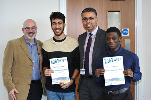 LibInspo 2019 winners Yuveer Ramchandani and Daniel Famiyeh receive their award from CEO of The Giving Machine Richard Morris and Director of Library and Archives Masud Khokhar.